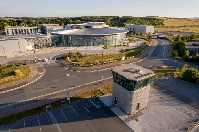 Facilities management team using two-way radios across buildings